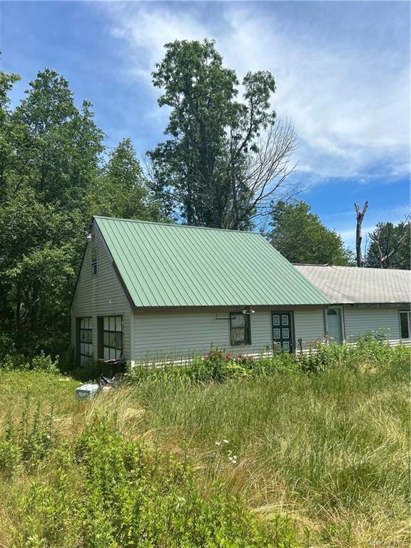 a house that has a lot of plants in it