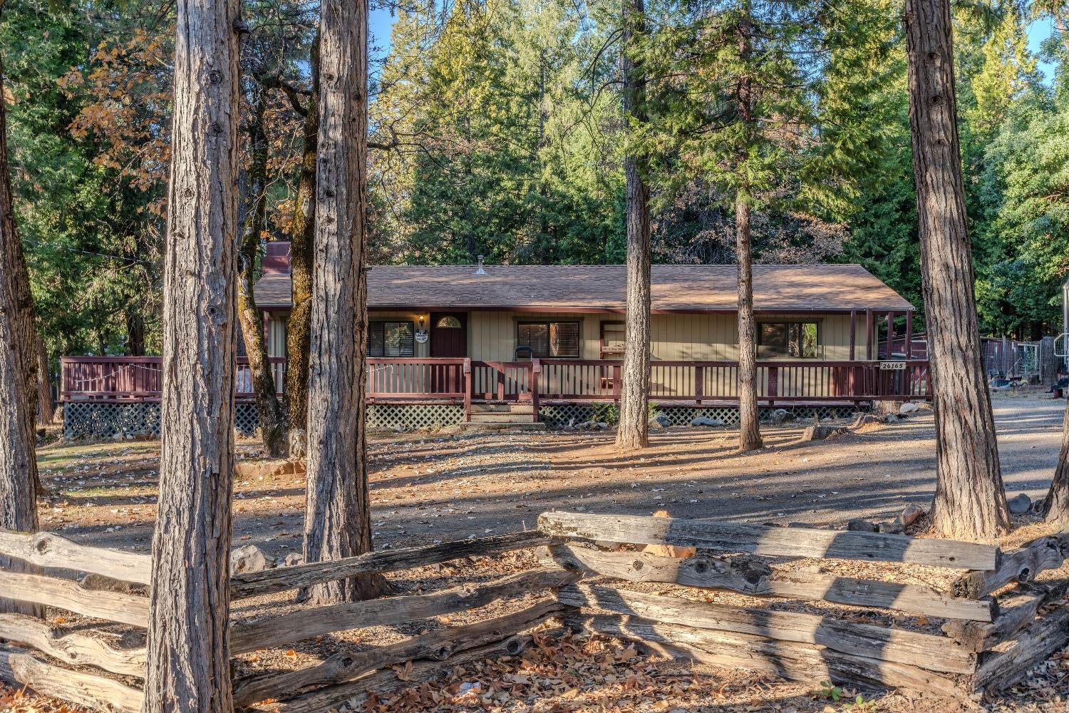 a front view of a house with street view