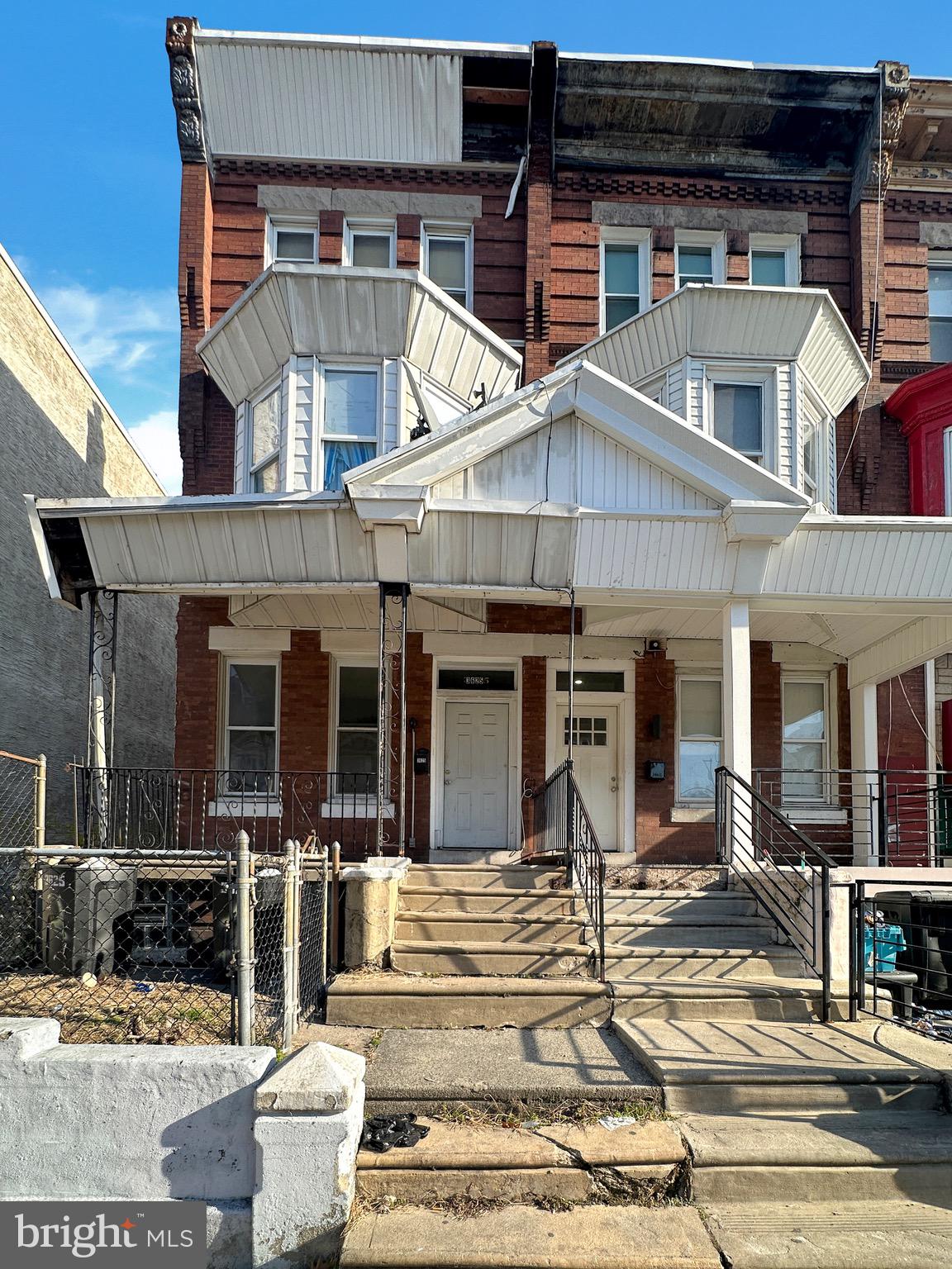 a front view of a house with garage