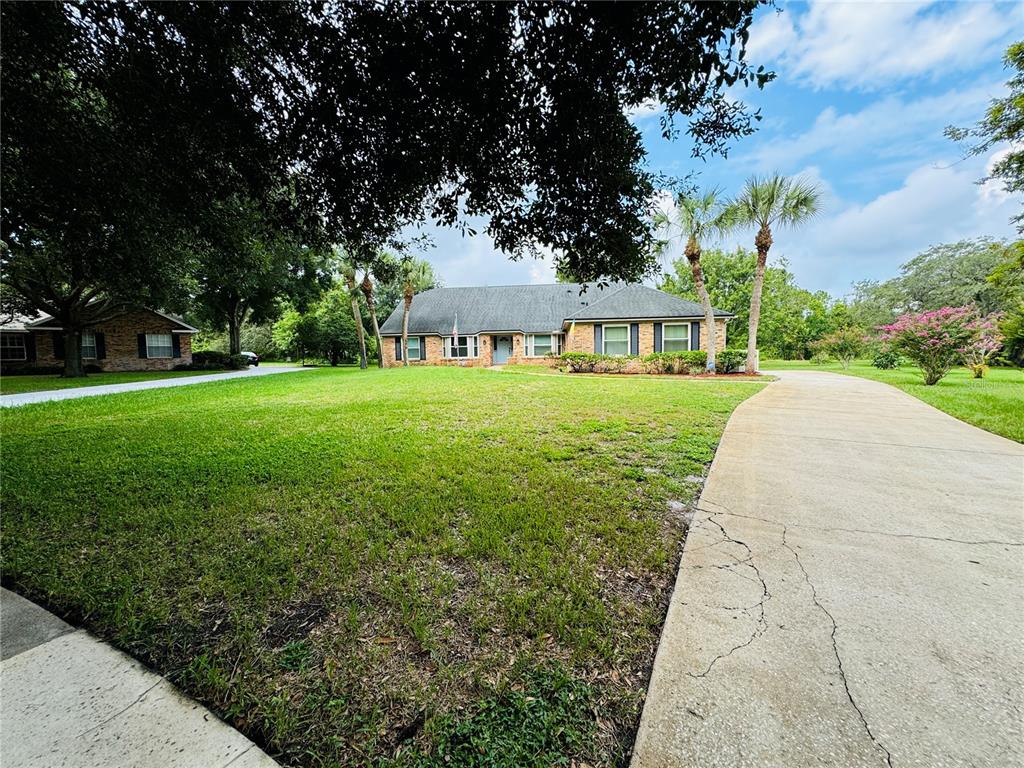 front view of a house with a yard