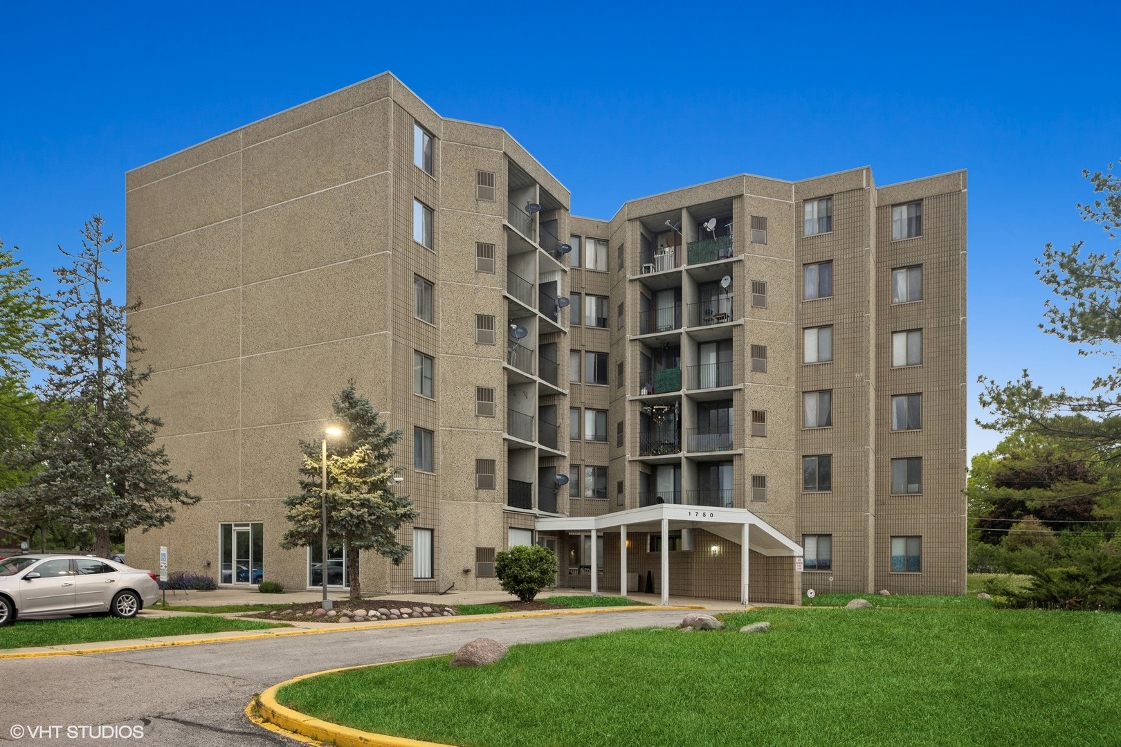 a view of building with yard