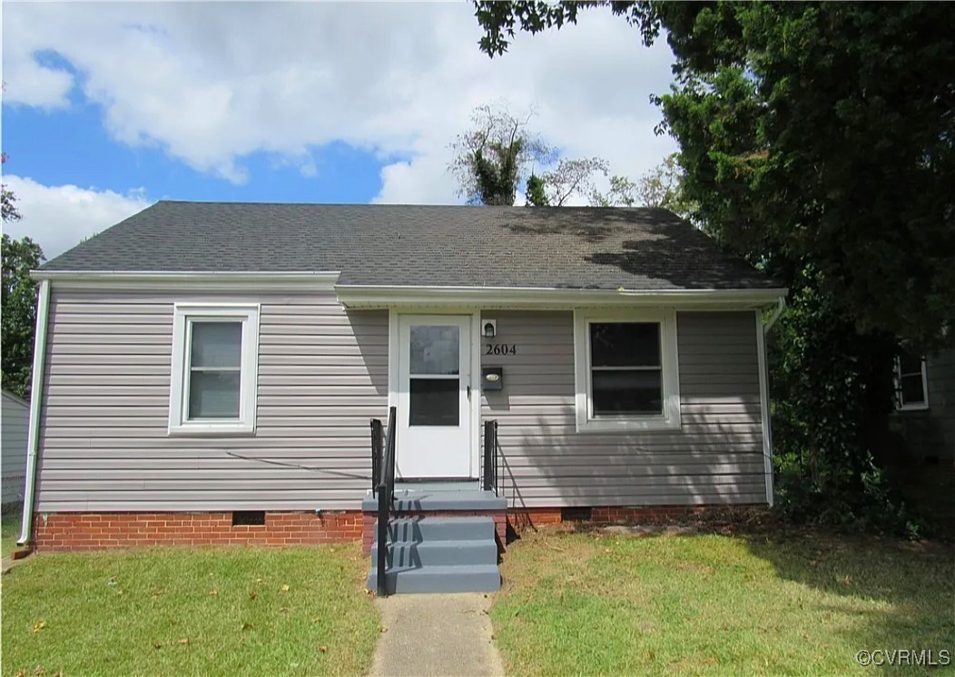 View of front of home with a front lawn