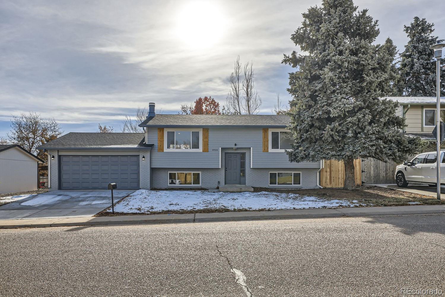 a view of a house with a street