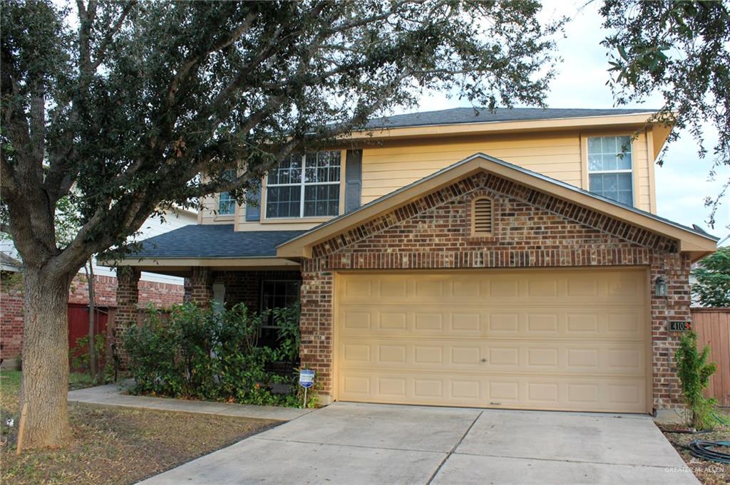 Front of property with a garage