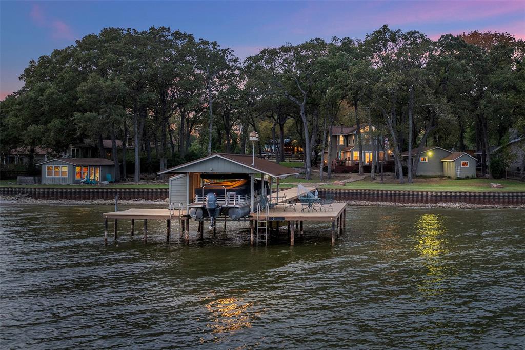 a view of a lake with sitting area