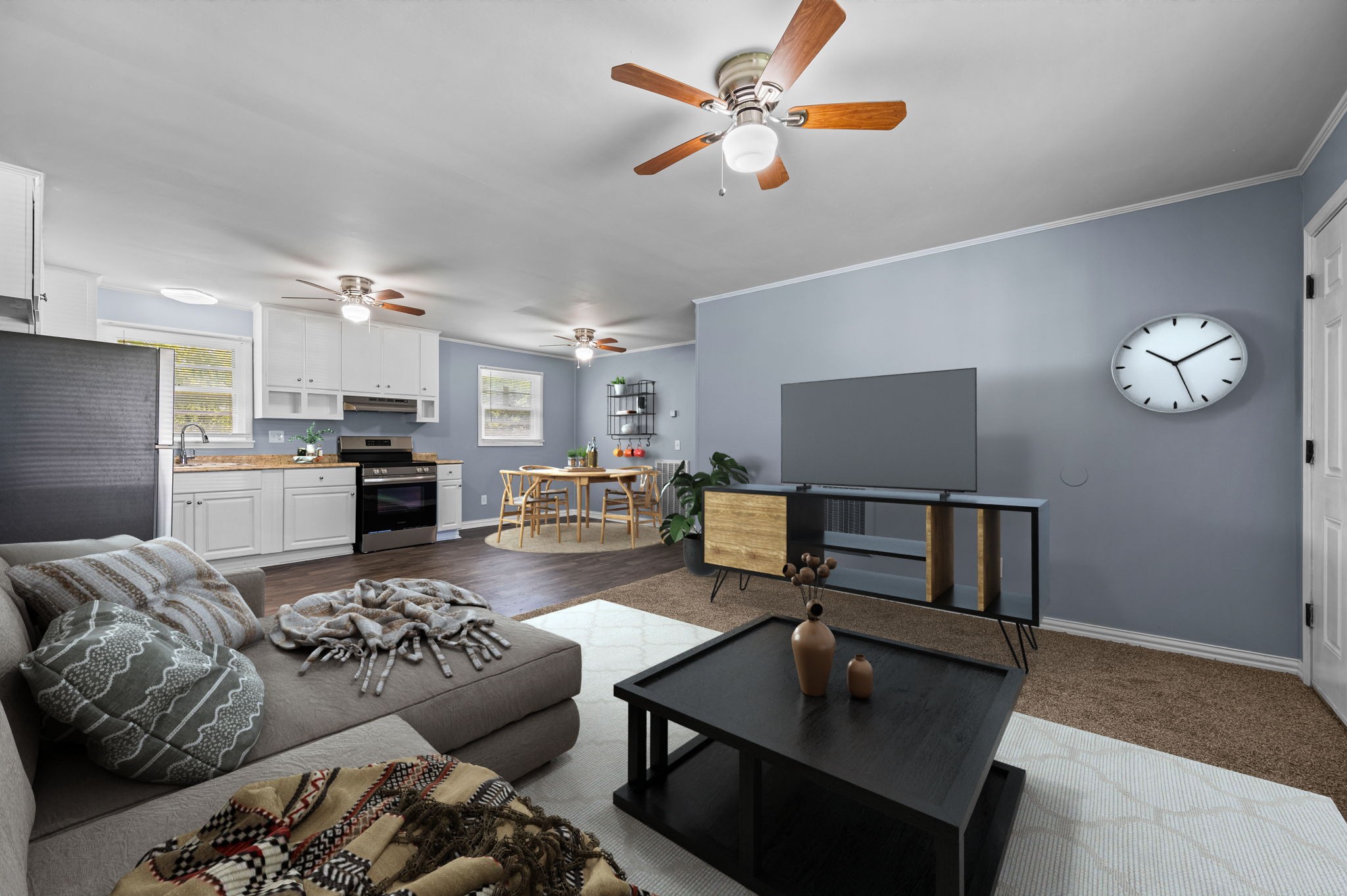 Open Living Room, Kitchen & Dining Area is Virtually Staged Which Suggest a Lovely Way To Arrange Your Furniture. New Carpet & Paint.