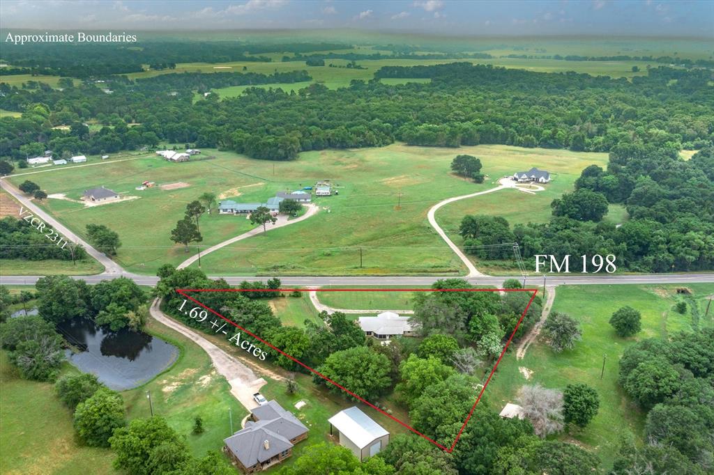 a view of a golf course with a lake