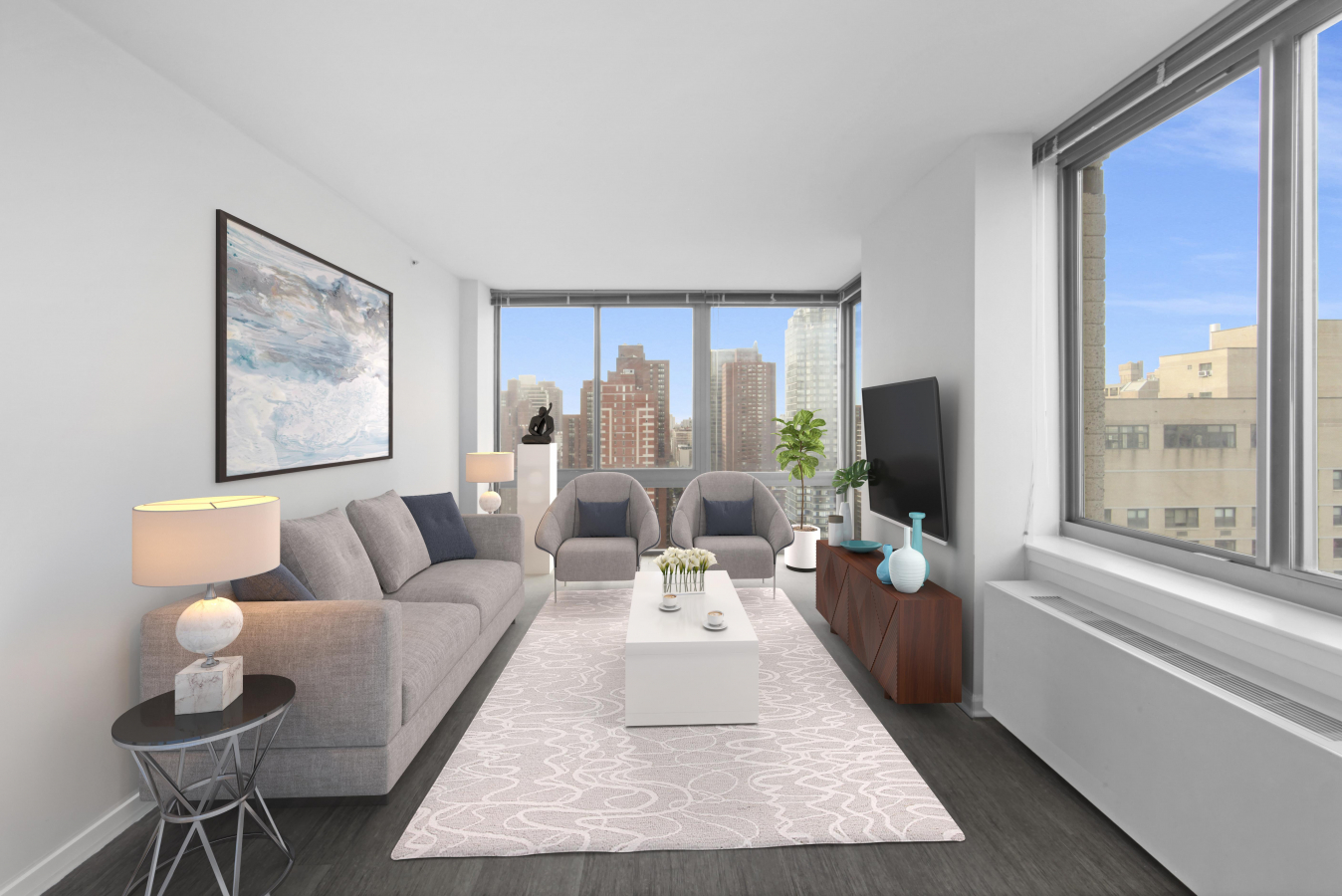 a living room with furniture and a flat screen tv