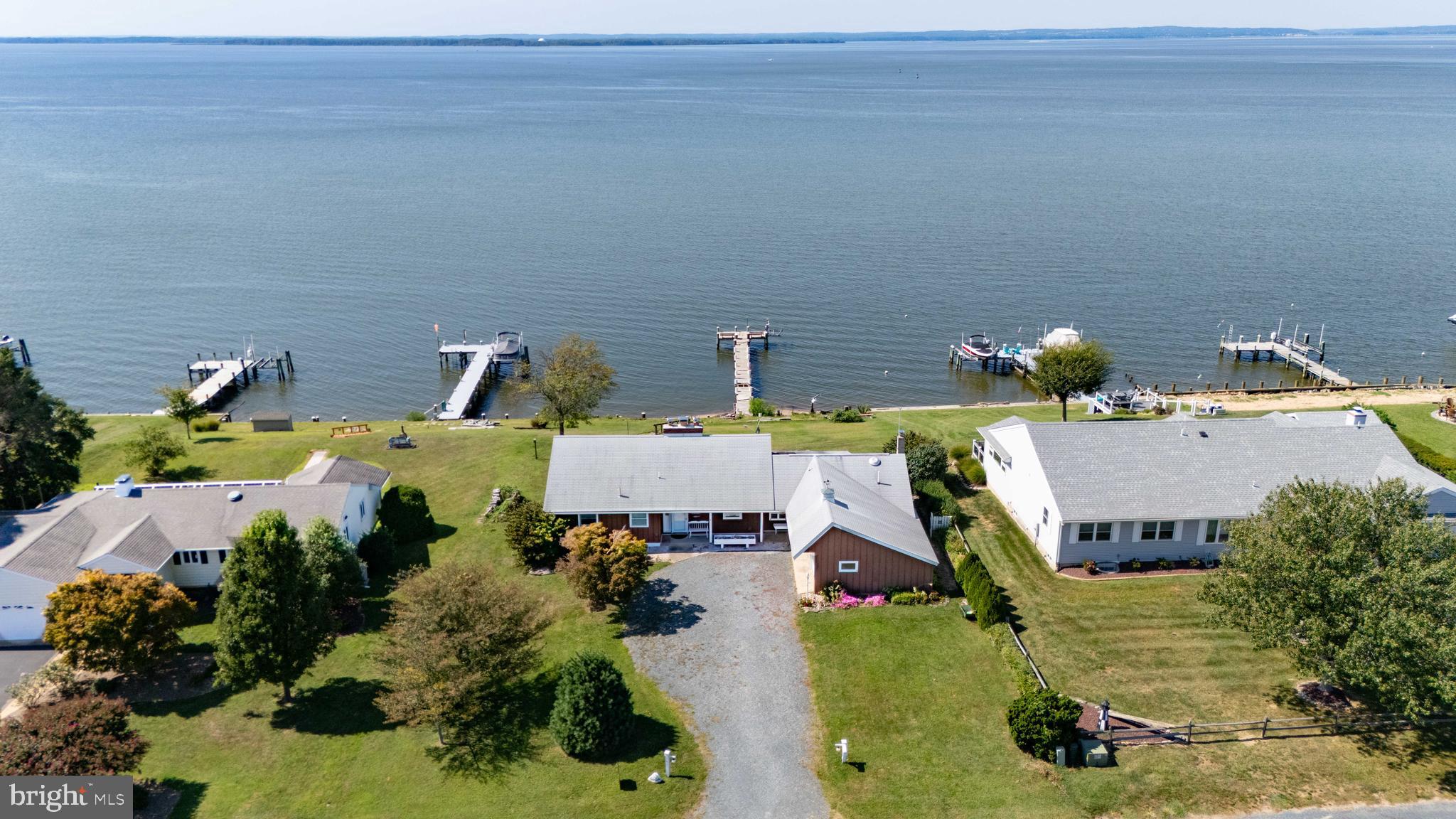 an aerial view of a house with swimming pool