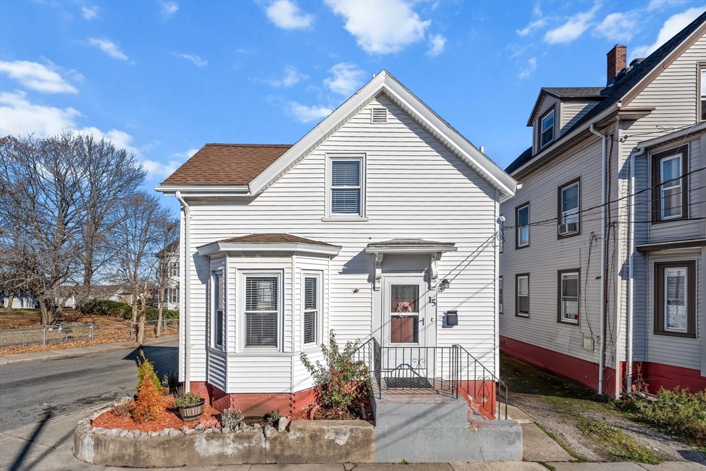 a front view of a house with a porch