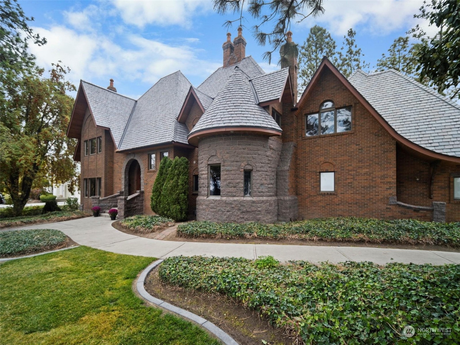 front view of a house with a yard