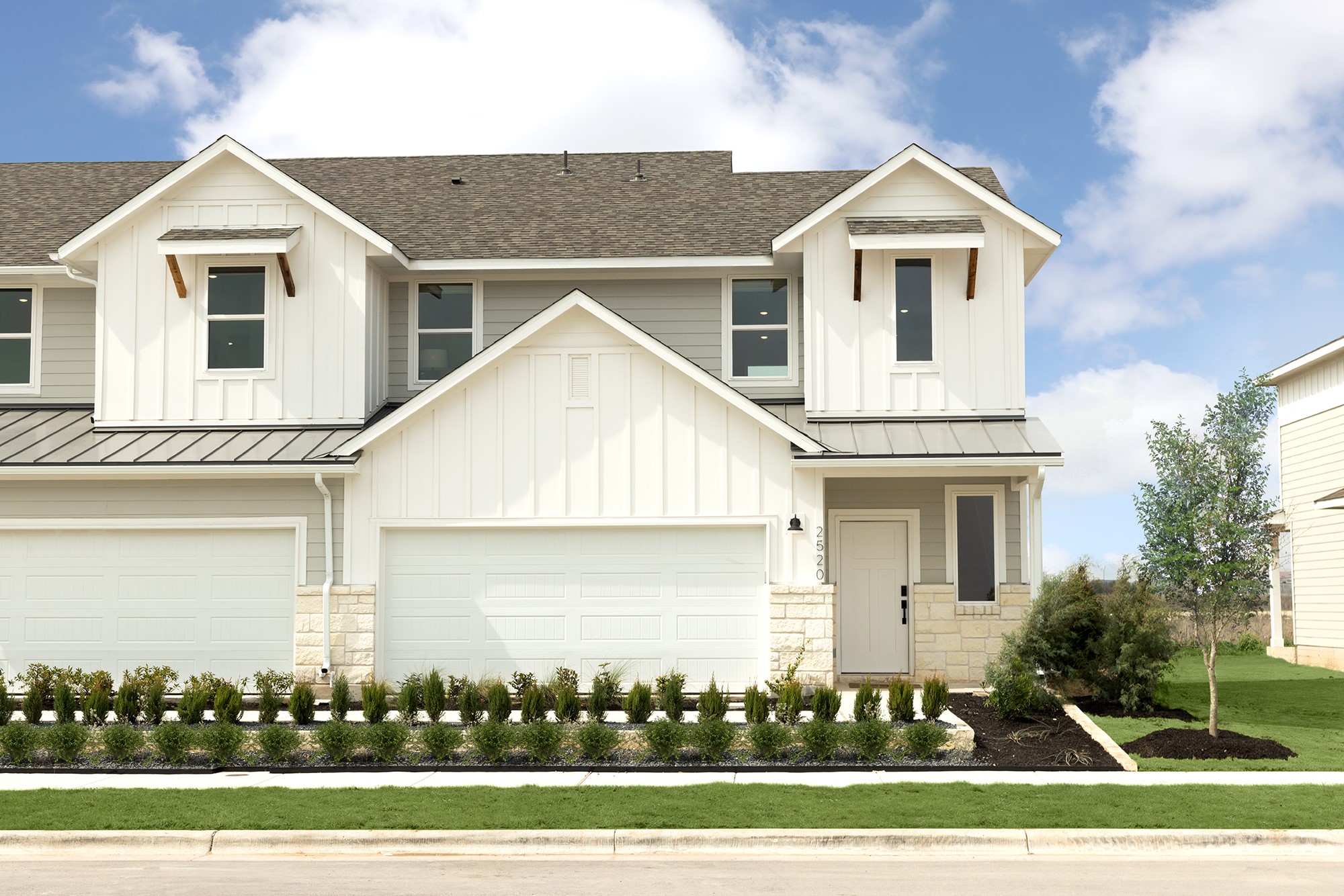 a view of a yard in front of a house