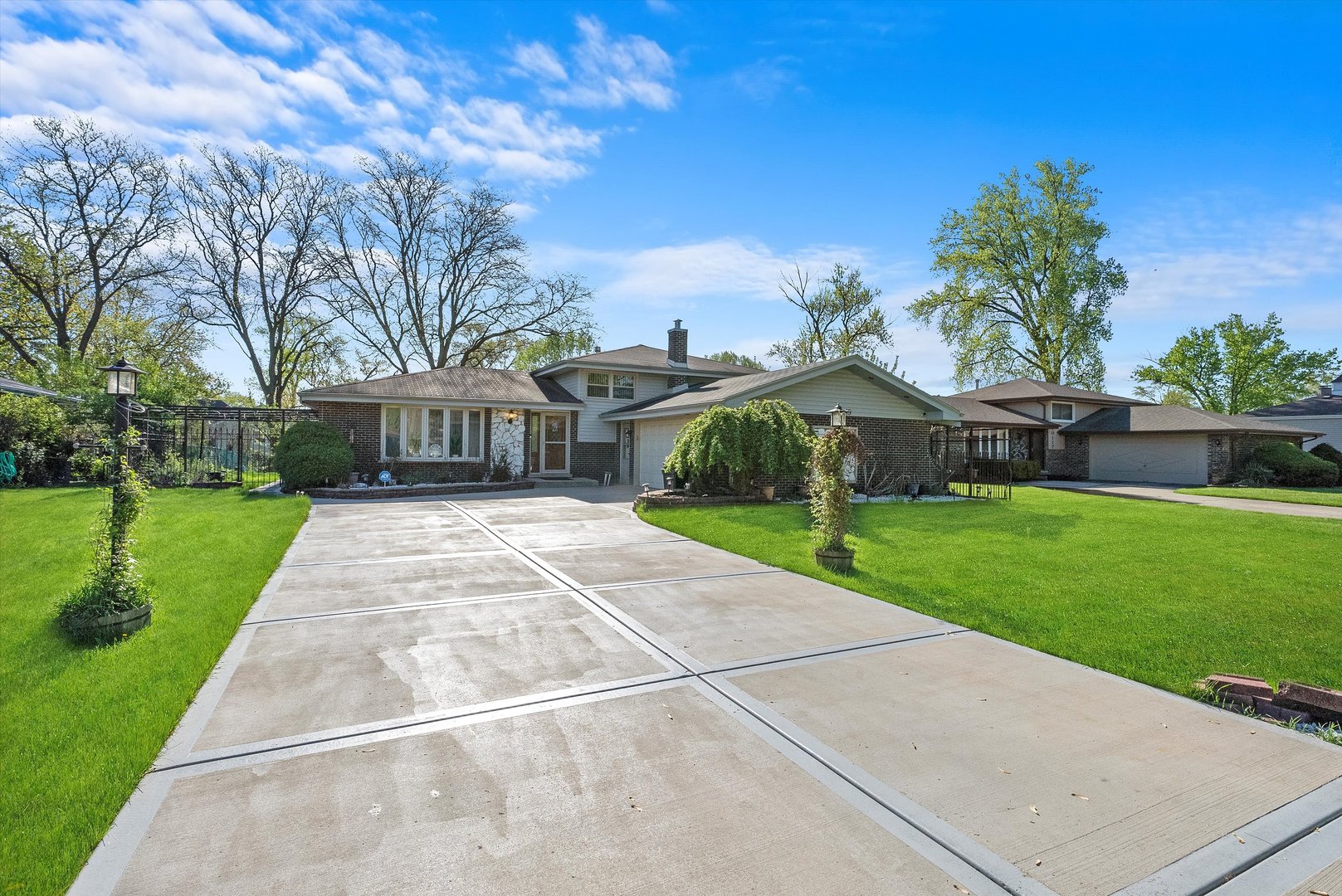 a house view with a garden space