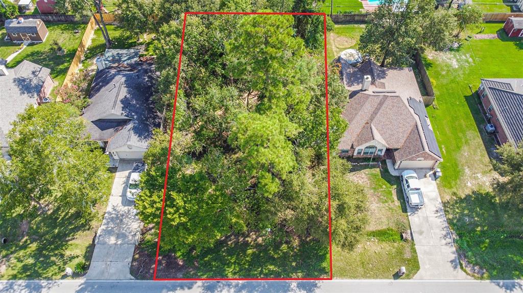 an aerial view of house with yard