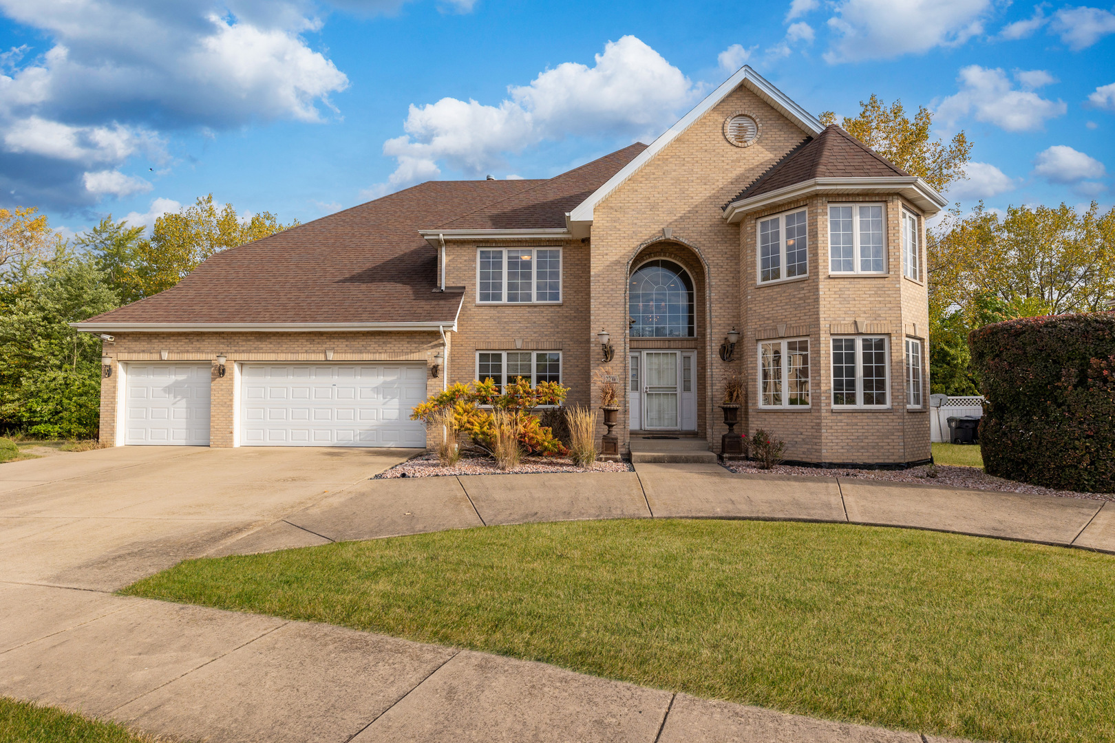 a front view of a house with patio