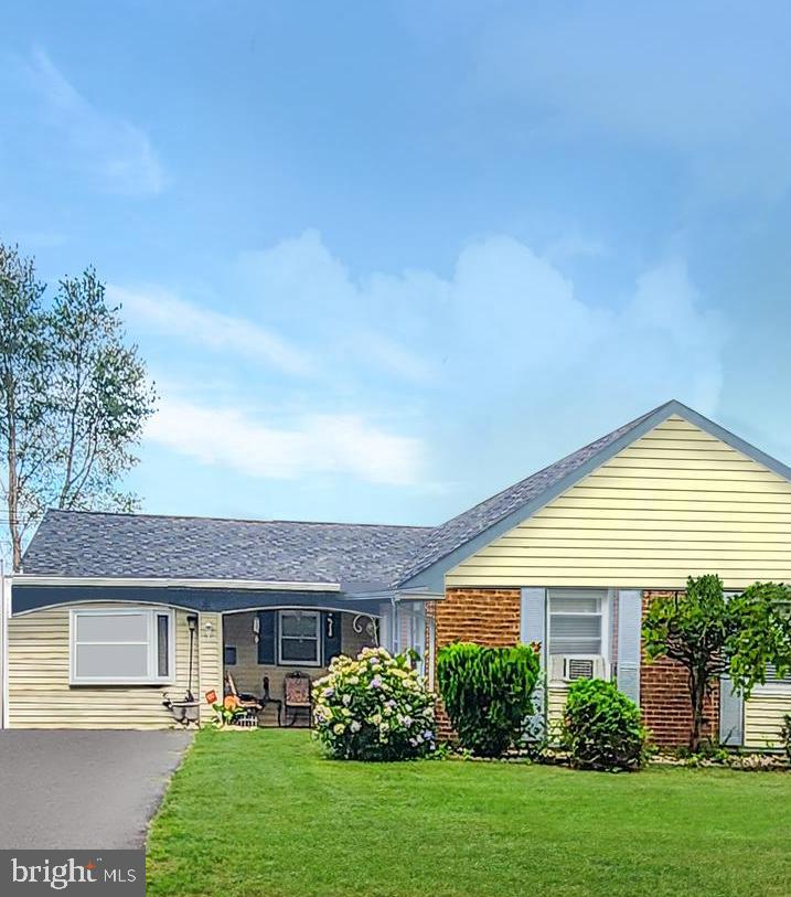 a view of outdoor space yard and front view of a house