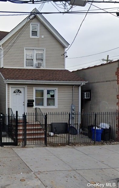 a front view of a house with a garage