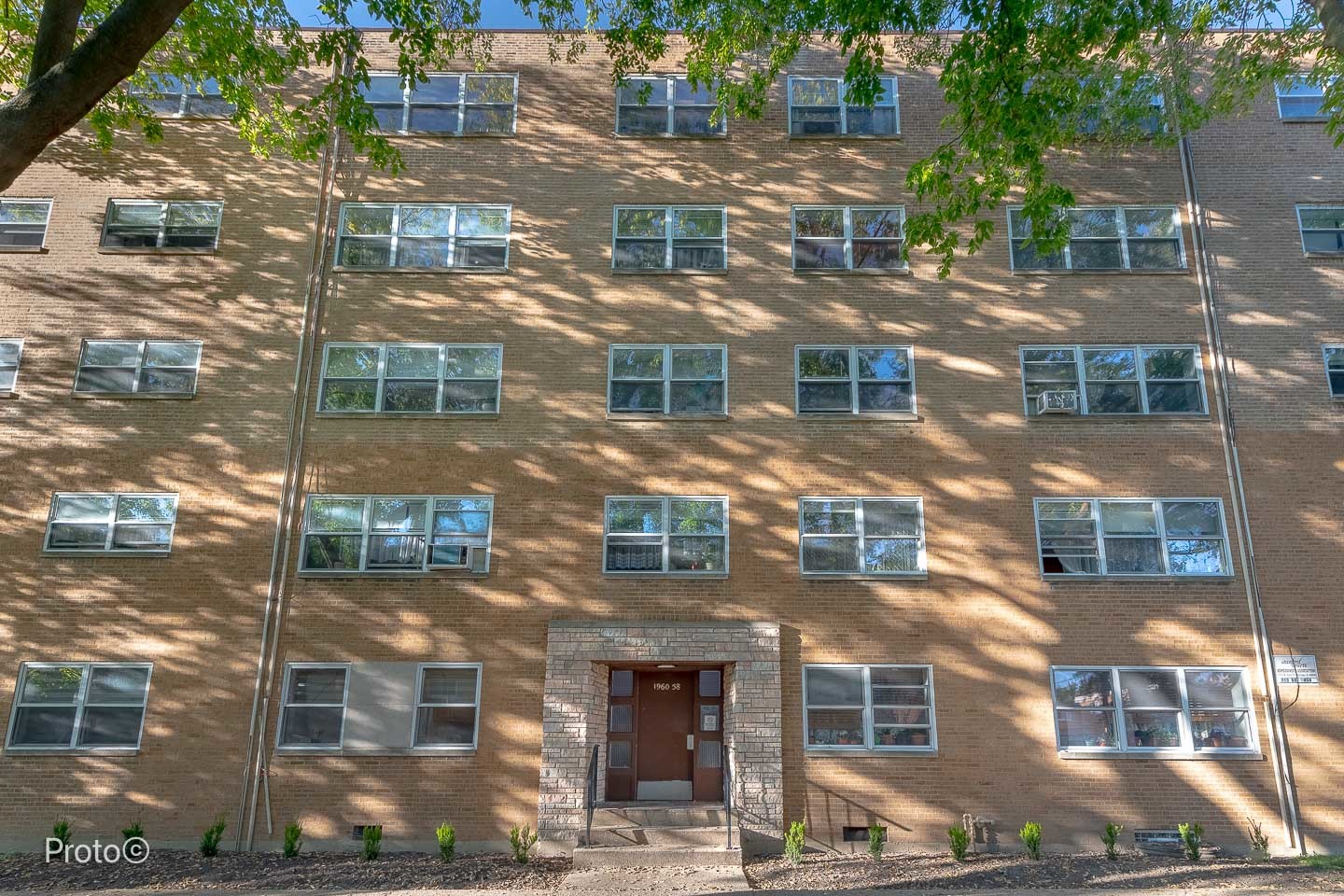 a front view of a multi story building