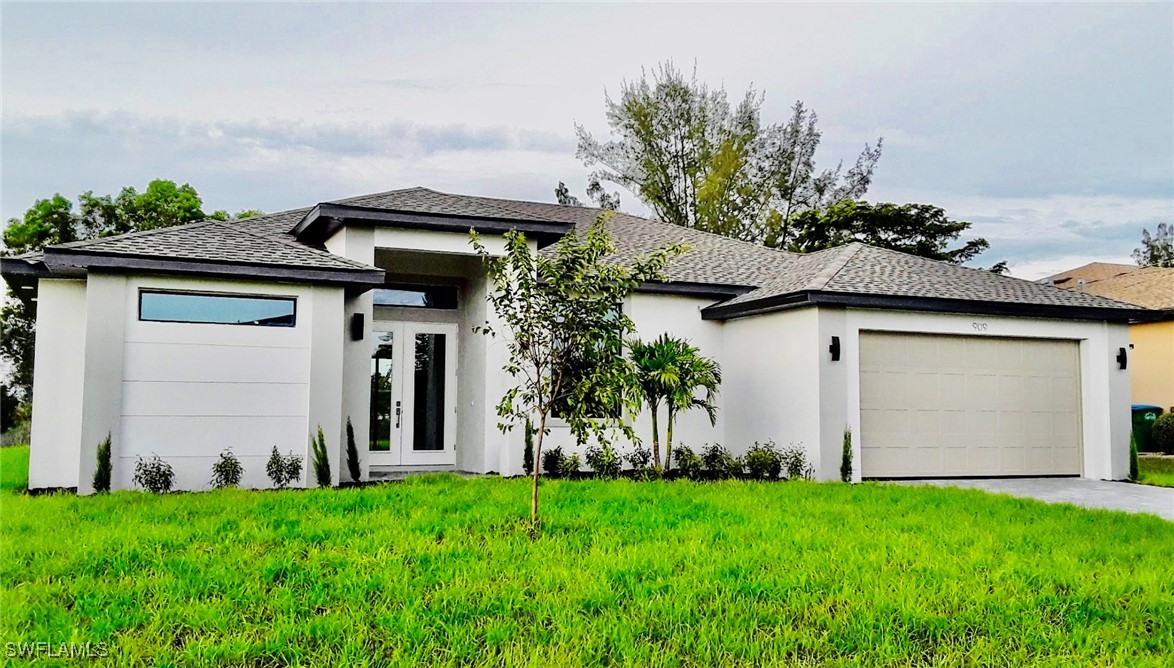 front view of a house with a yard