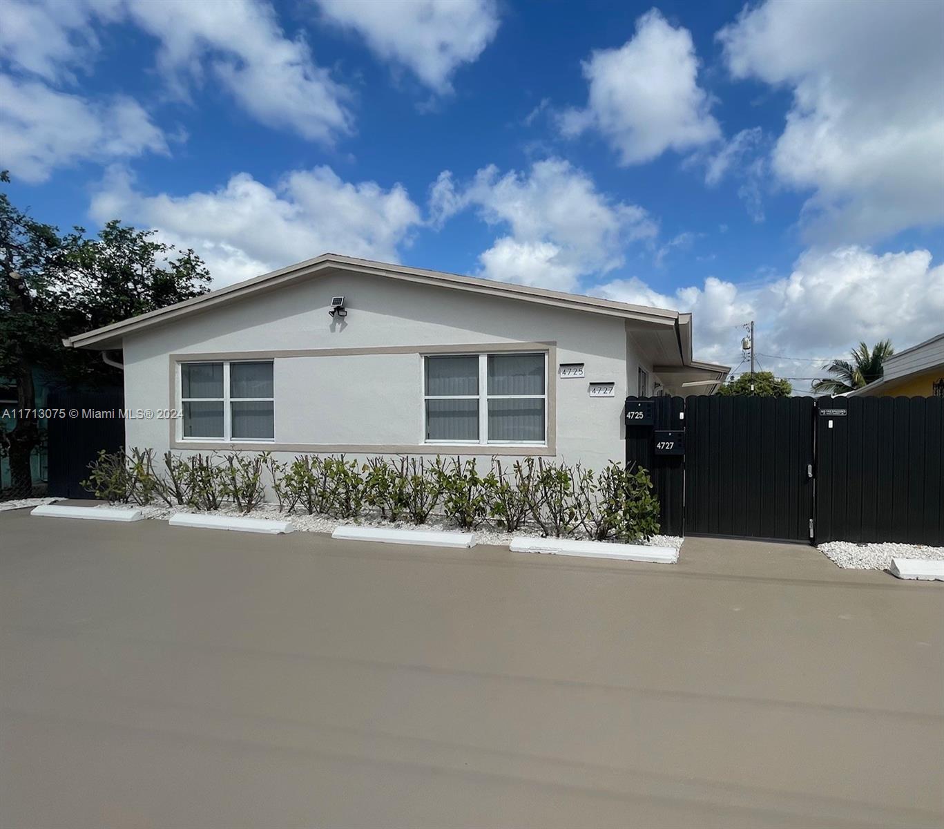 front view of house with a yard