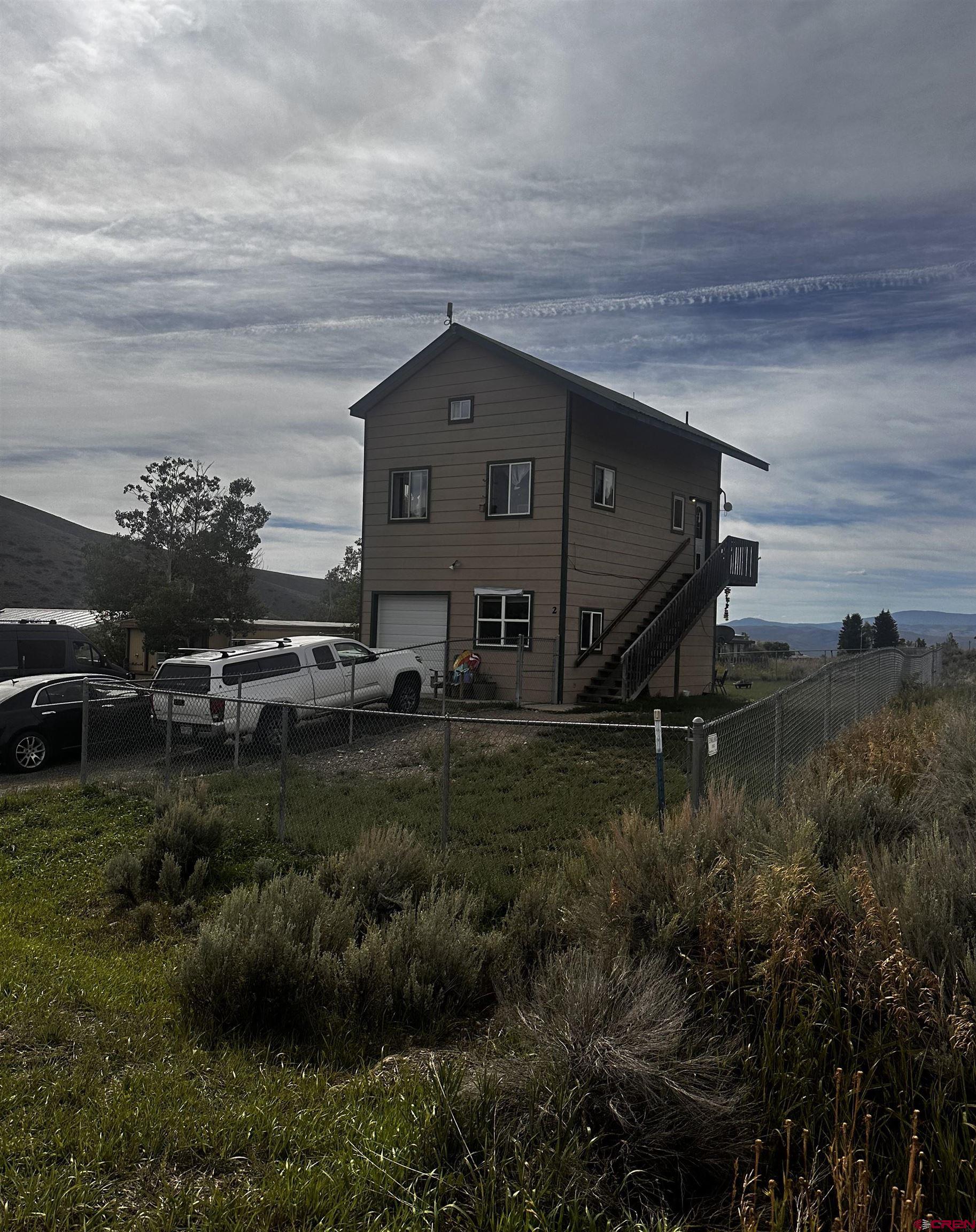 a house view with a outdoor space