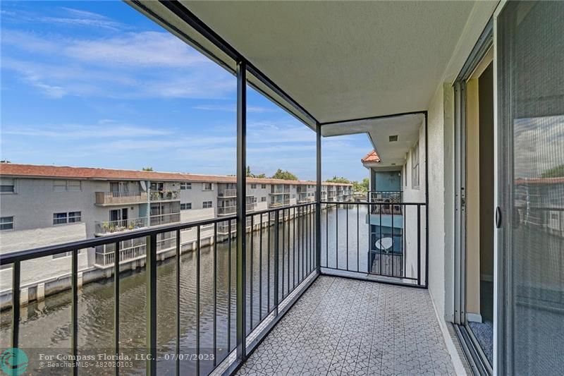 a view of a balcony with city view