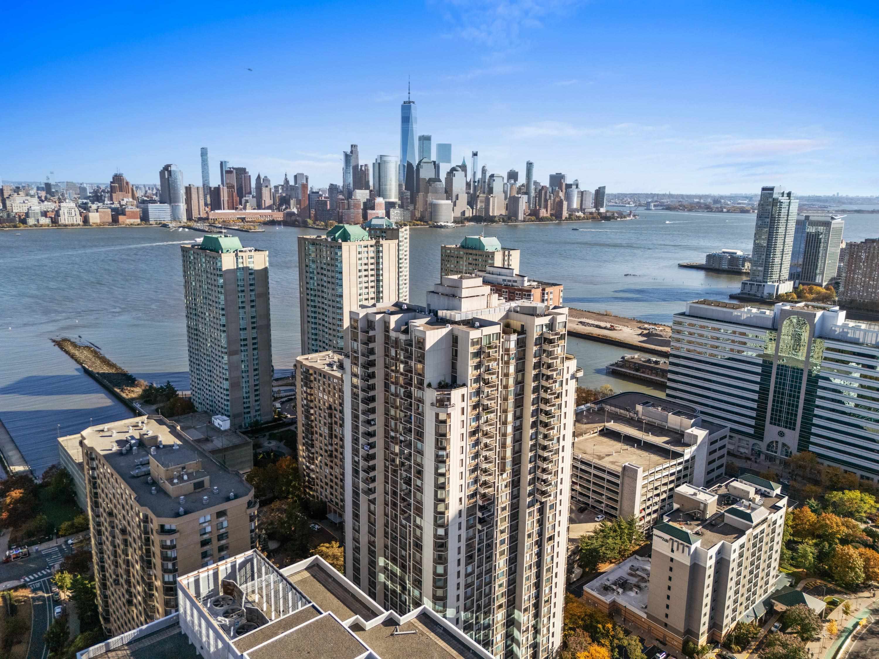 a view of a city with tall buildings