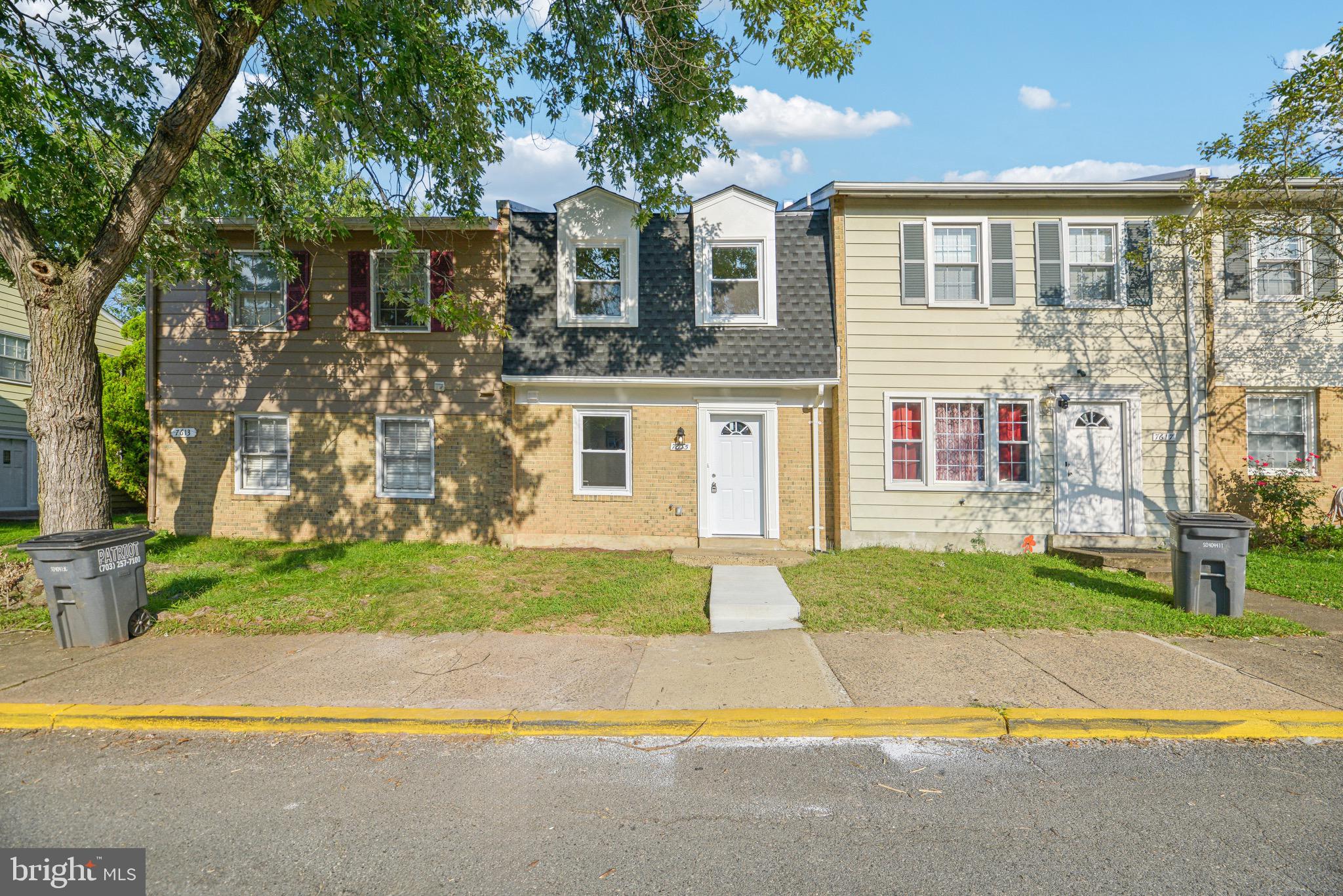 a front view of house with yard