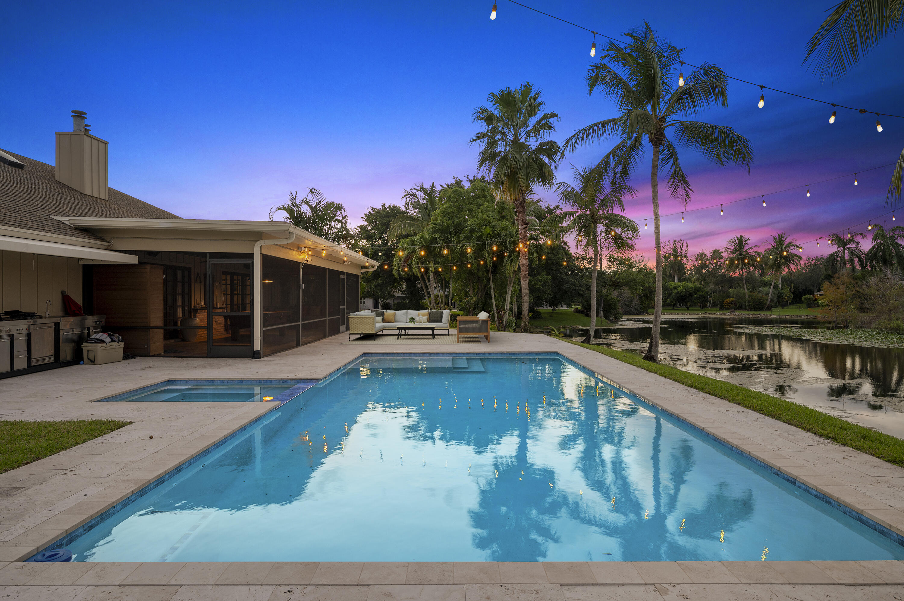 a view of a house with swimming pool