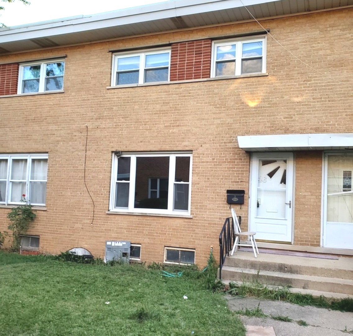 a front view of a house having yard