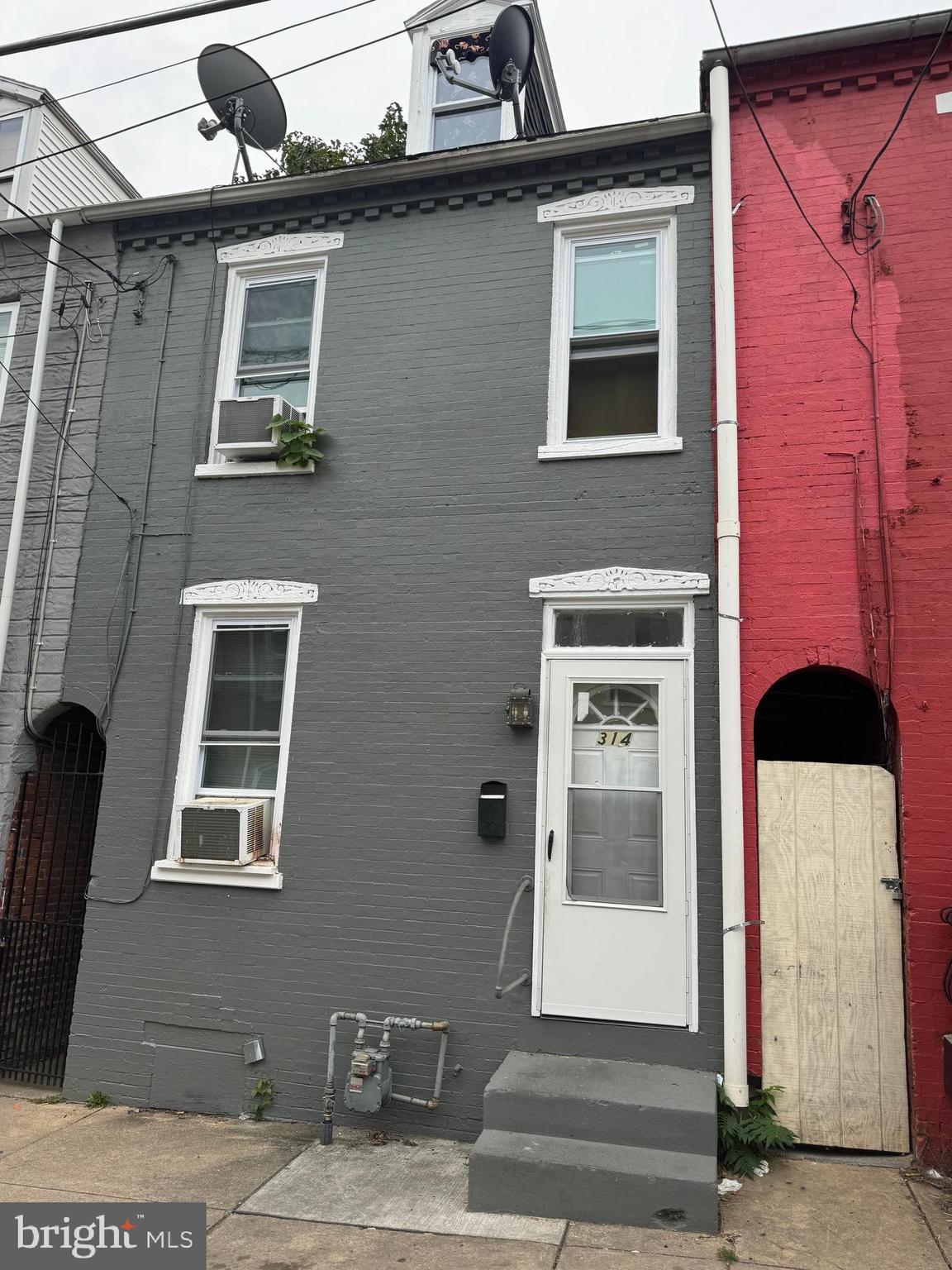 a front view of a house with a balcony