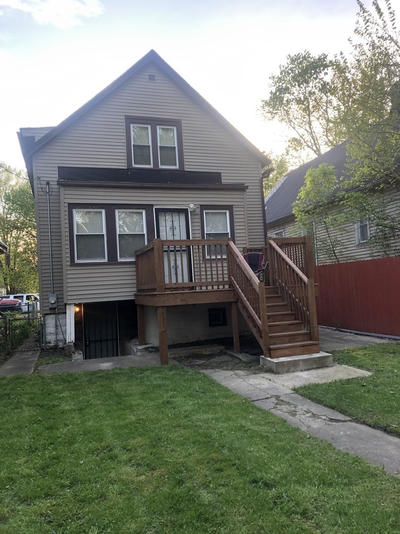 a house view with a garden space