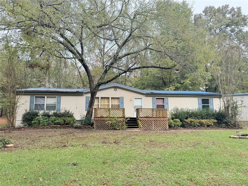 front view of house with a yard