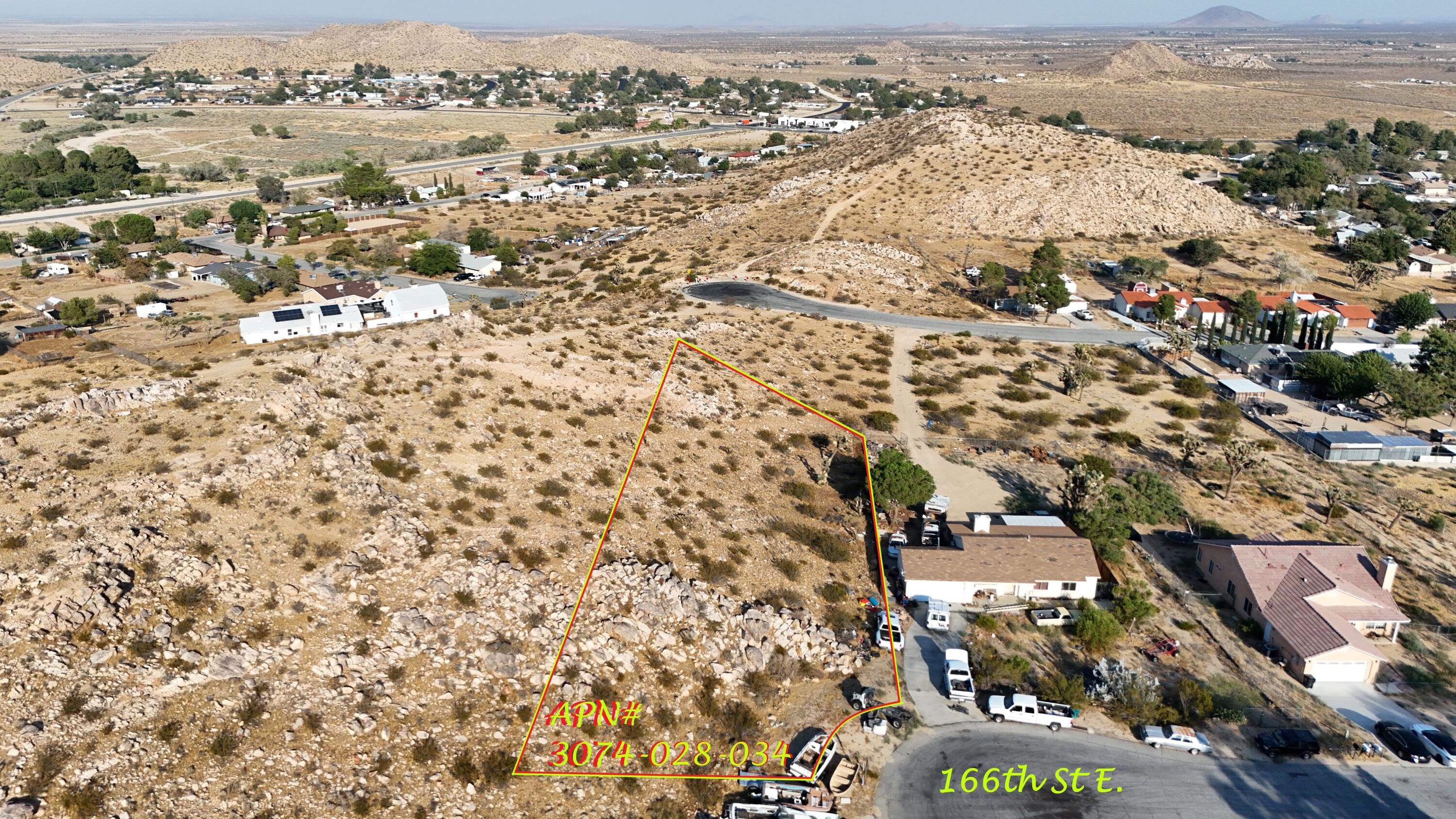 an aerial view of residential building with parking space