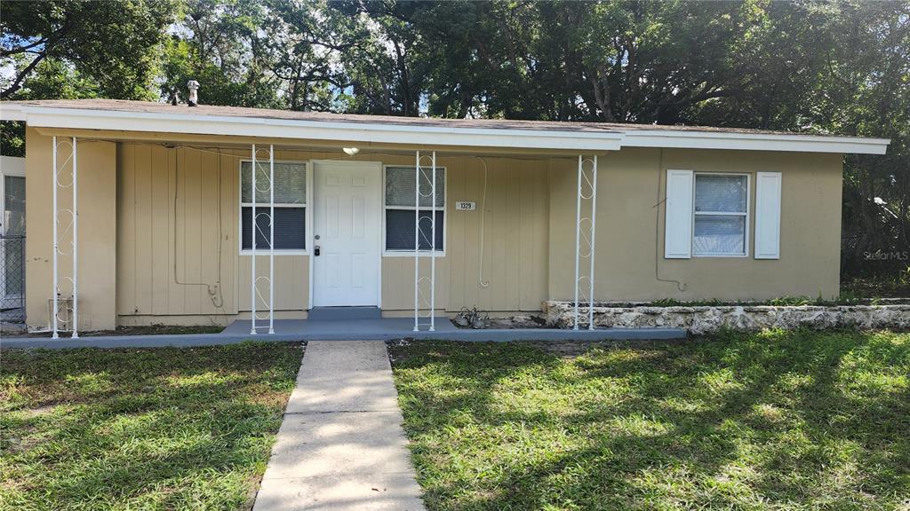 front view of house with a yard