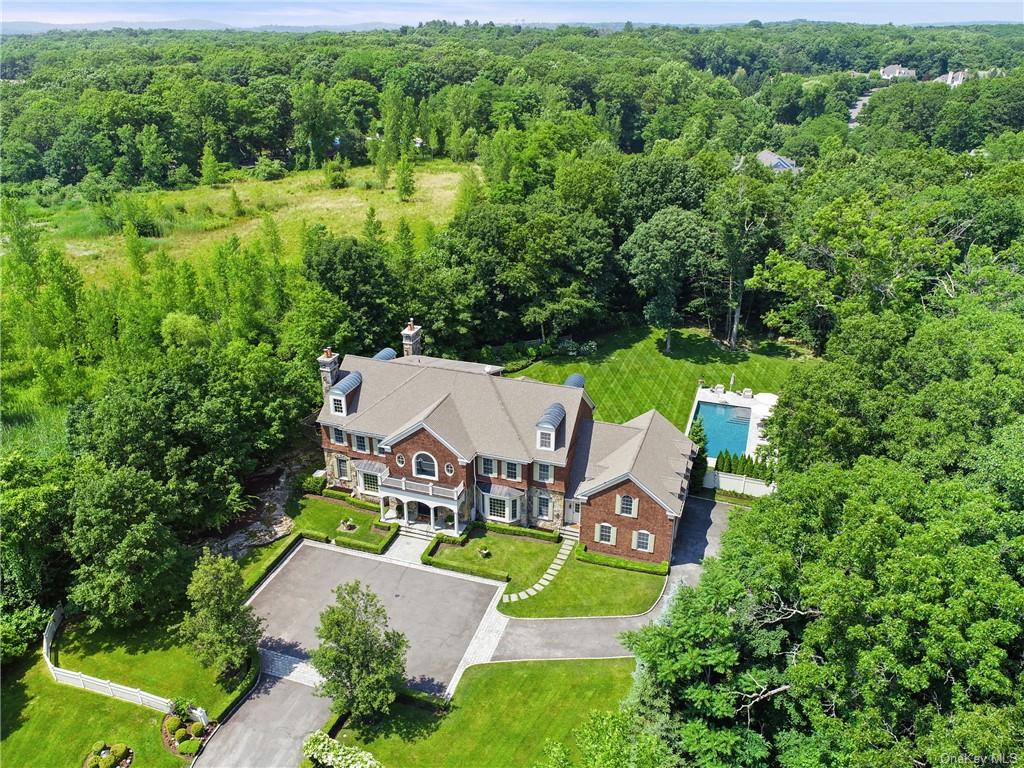 an aerial view of a house with a garden