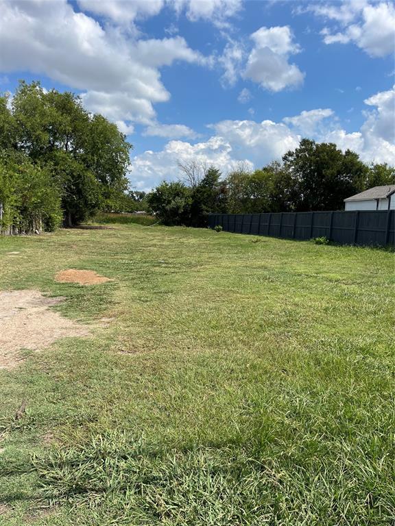 a view of a field with an outdoor space