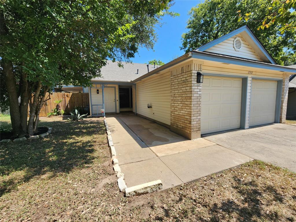 a view of backyard of house