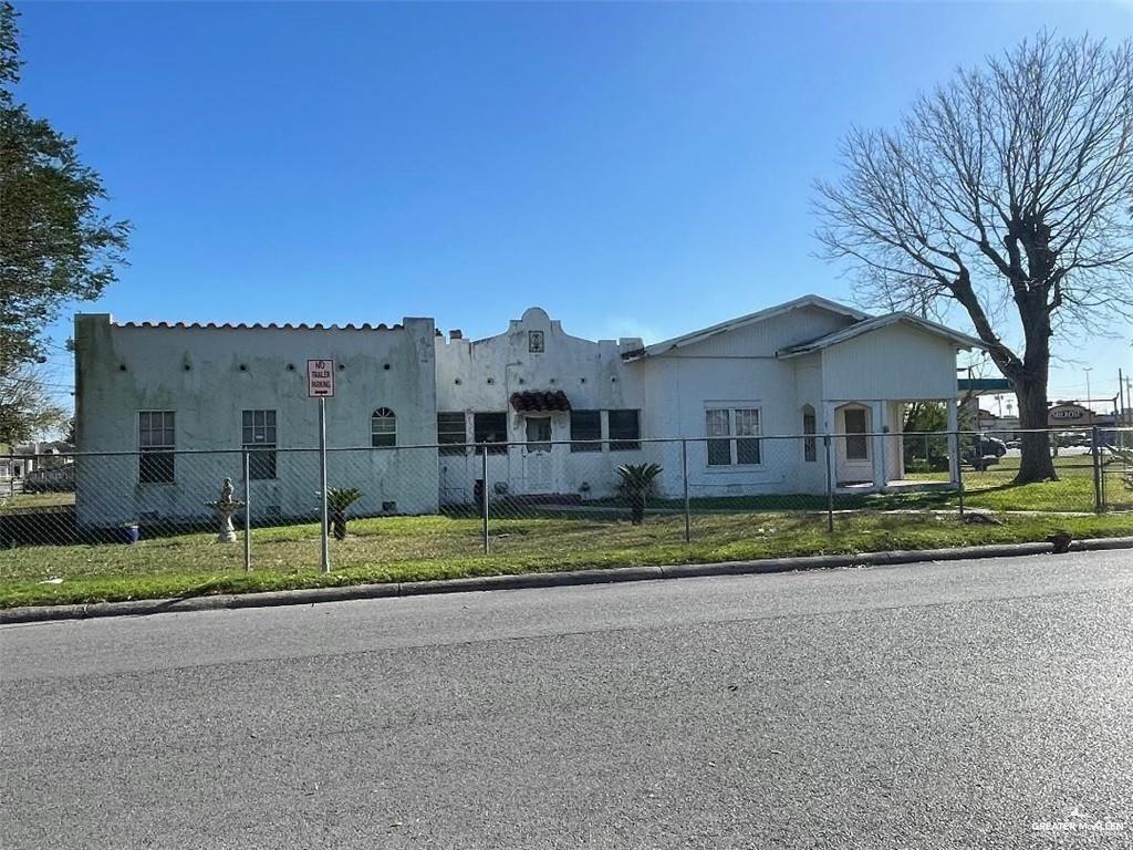 a view of house with outdoor space and street view