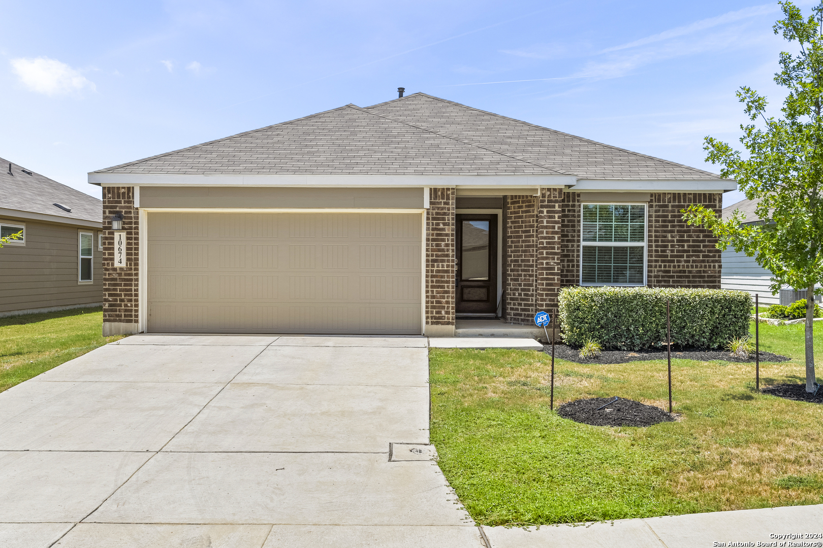 a front view of house with yard