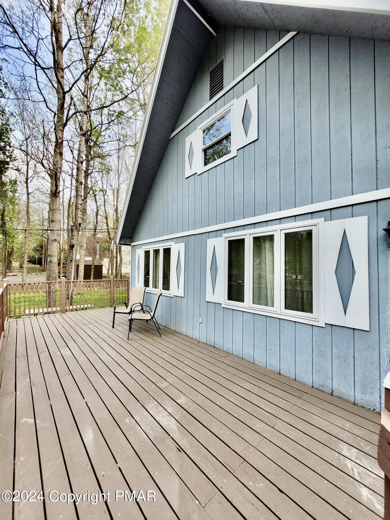 a porch with seating space and yard