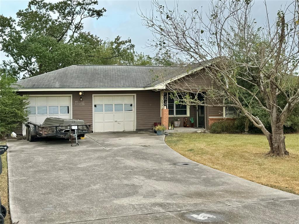 a view of a car parked in front of house