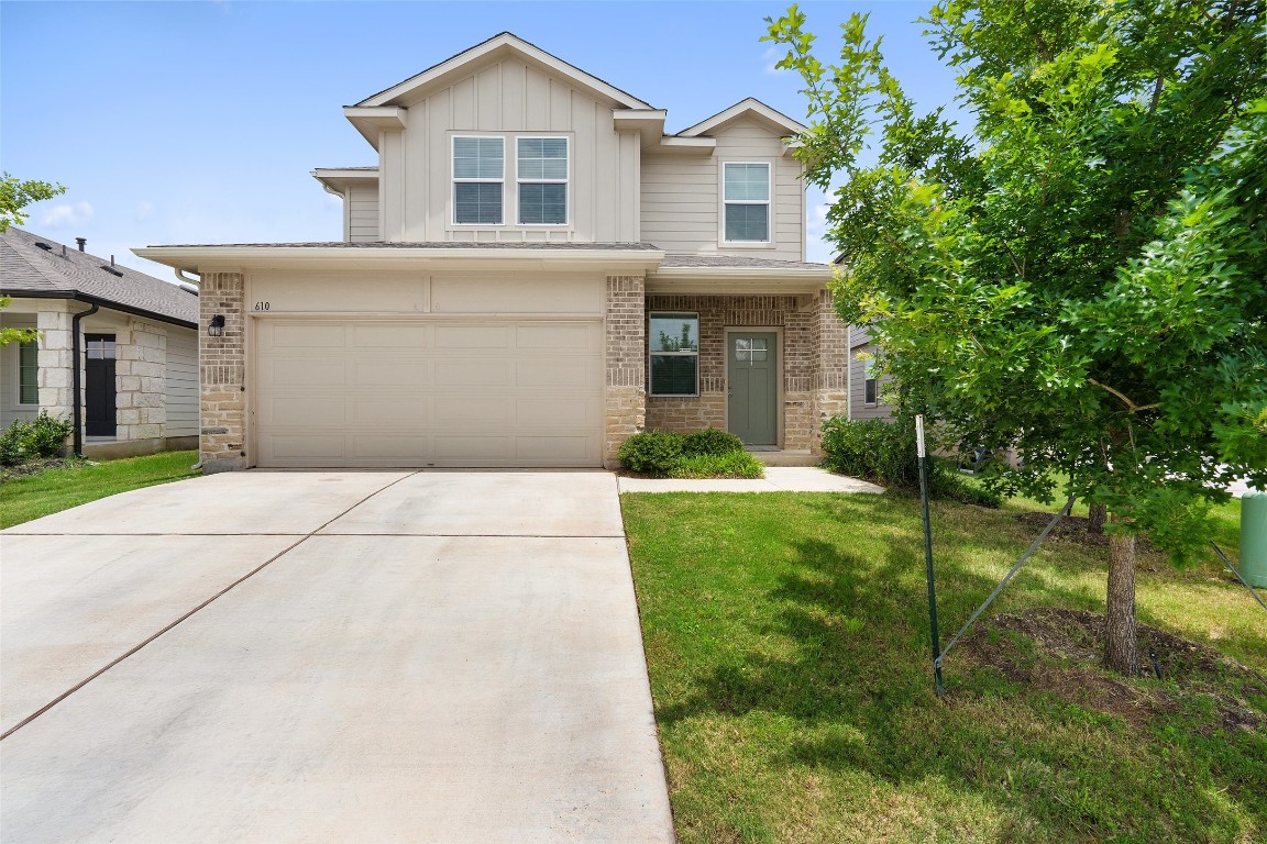 a front view of house with yard