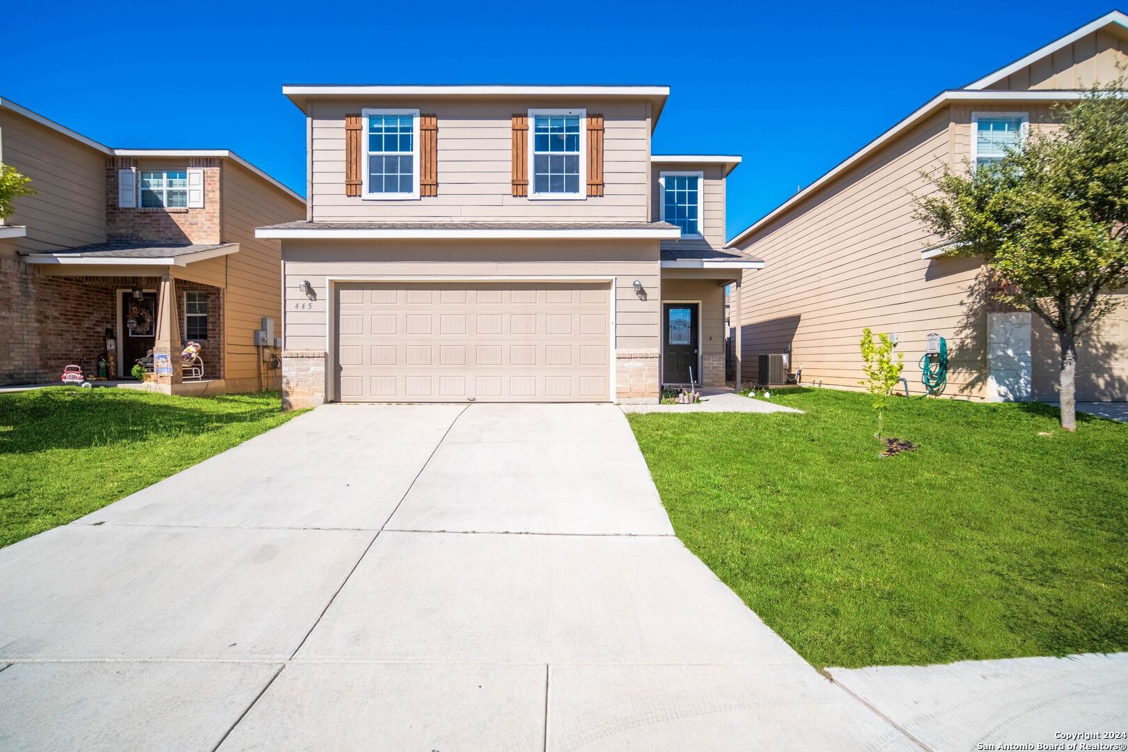 a front view of house with yard