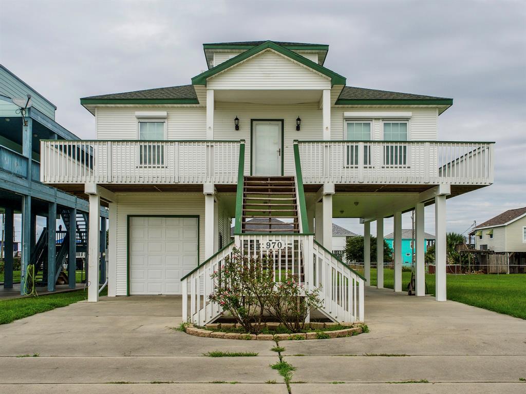 a front view of a house with a porch