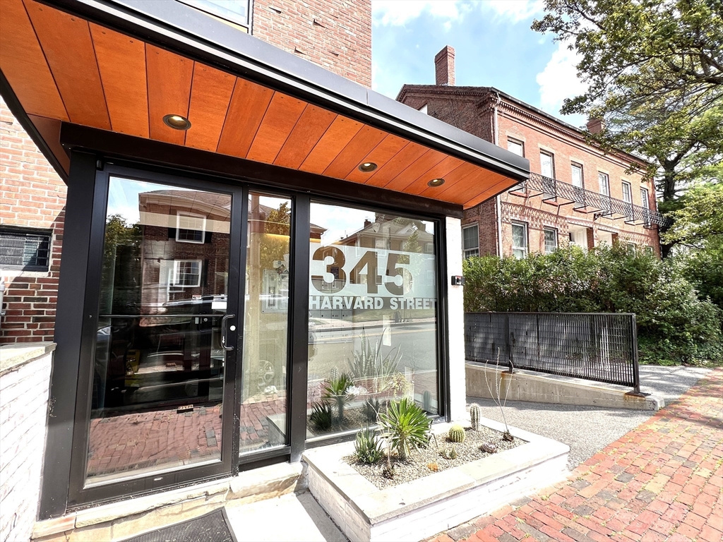 a front view of a building with a glass door