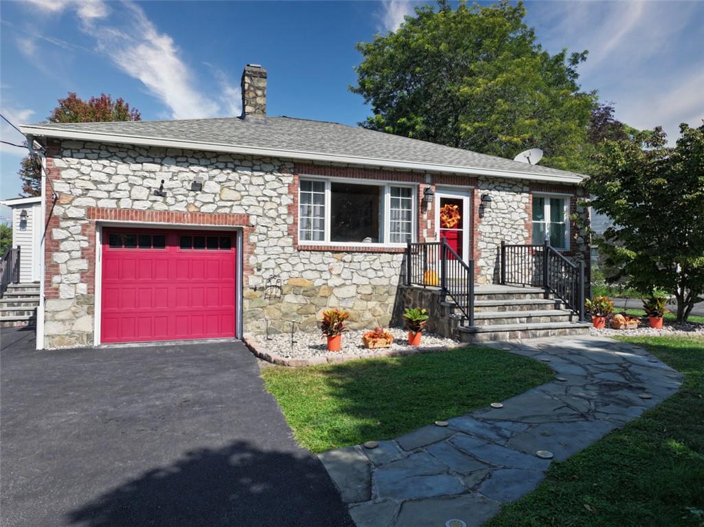 View of front of house with a garage