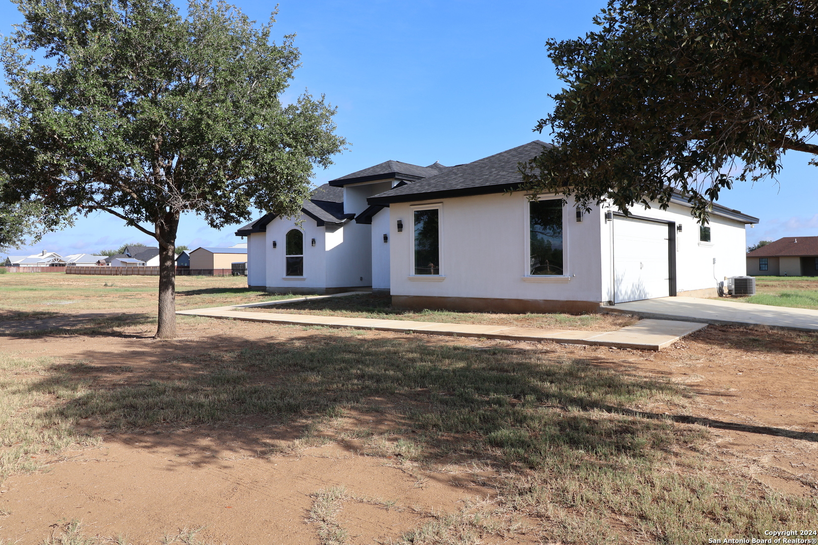 a house view with a outdoor space