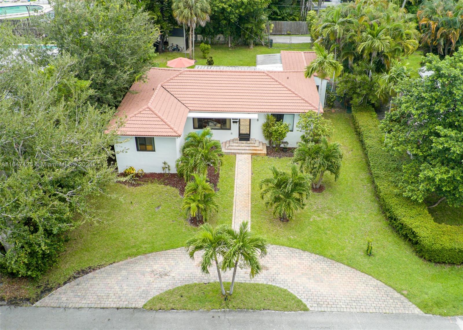 a house with a yard in front of it