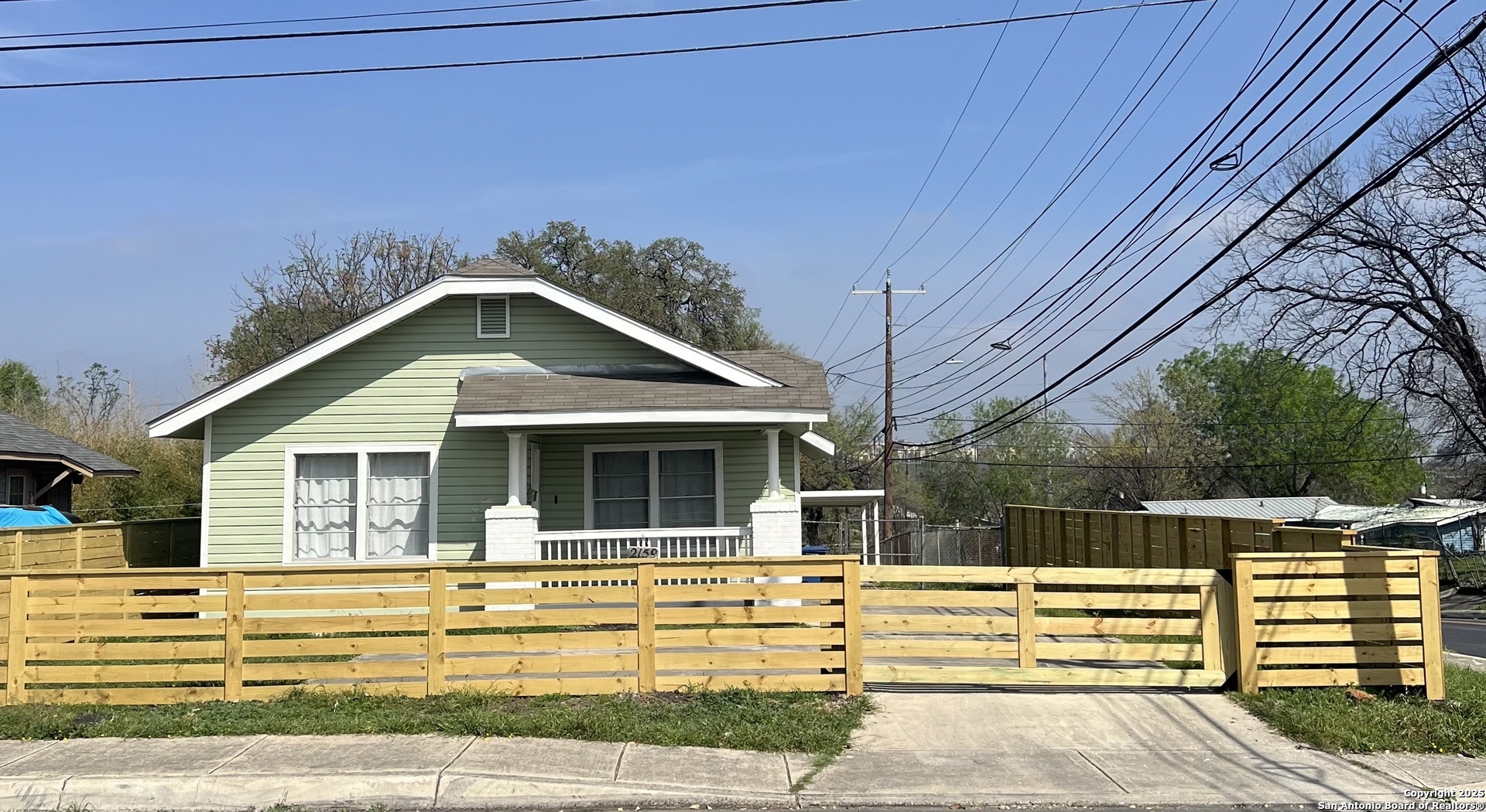 a view of a house with a swimming pool